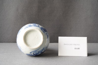 A Chinese blue and white double gourd vase with figures in a landscape, Transitional period