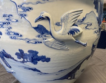 A rare large Chinese blue and white relief-moulded jardini&egrave;re, Kangxi