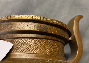 A Chinese bronze tripod censer with 'lotus leaf' cover and stand, 17/18th C.