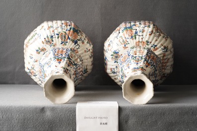 A pair of exceptional large ribbed Dutch Delft cashmere palette vases with flower vases, ca. 1700