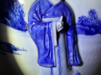 A rare large Chinese blue and white relief-moulded jardini&egrave;re, Kangxi