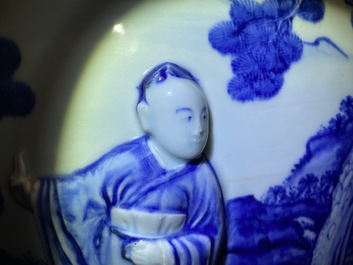 A rare large Chinese blue and white relief-moulded jardini&egrave;re, Kangxi