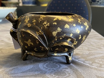 A Chinese gold-splashed bronze peach-form censer, Xuande mark, 18th C.