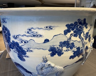 A rare large Chinese blue and white relief-moulded jardini&egrave;re, Kangxi