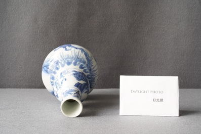 A Chinese blue and white double gourd vase with figures in a landscape, Transitional period