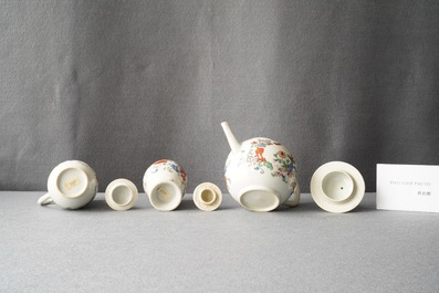 A Chinese famille rose teapot, tea caddy, milk jug and tray, Qianlong