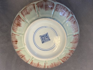 A Chinese celadon-ground copper red 'dragon' bowl, Kangxi