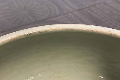 A Chinese celadon-glazed tripod censer with incised underglaze design, Kangxi