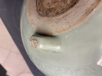 A Chinese celadon-glazed tripod censer with incised underglaze design, Kangxi