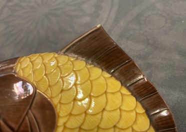 A Chinese carp-shaped sancai-glazed brush washer, Qianlong mark, 19th C.
