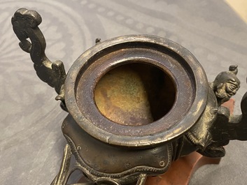 Two Chinese bronze censers, a vase and a mirror, Ming and later