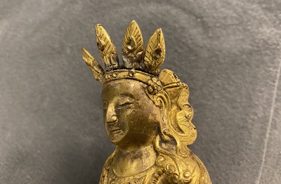 A Sino-Tibetan gilt bronze figure of Buddha, 18th C.
