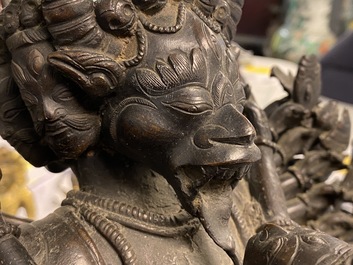 A Tibetan bronze group of Mahakala and his consort Yab-Yum, 19th C.