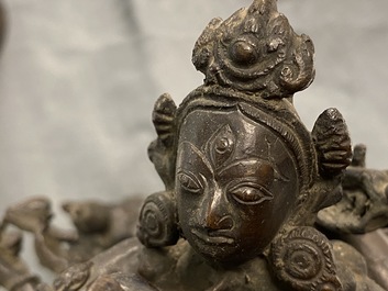 A Tibetan bronze group of Mahakala and his consort Yab-Yum, 19th C.