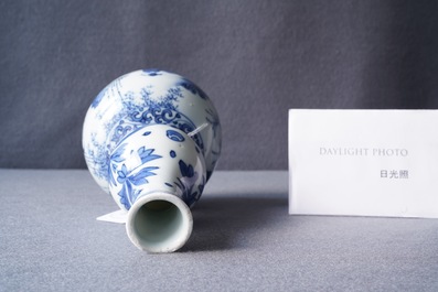 A Chinese blue and white double gourd vase with figures in a landscape, Transitional period