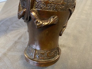 A Chinese dragon-handled bronze vase, Ming