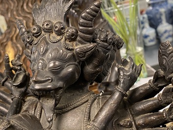 A Tibetan bronze group of Mahakala and his consort Yab-Yum, 19th C.