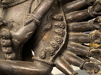 A Tibetan bronze group of Mahakala and his consort Yab-Yum, 19th C.