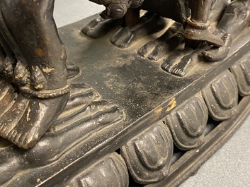 A Tibetan bronze group of Mahakala and his consort Yab-Yum, 19th C.