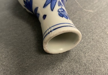 A Chinese blue and white double gourd vase with figures in a landscape, Transitional period