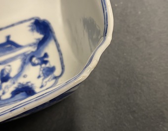 A Chinese blue and white bowl with a lady with cat, Kangxi mark and of the period