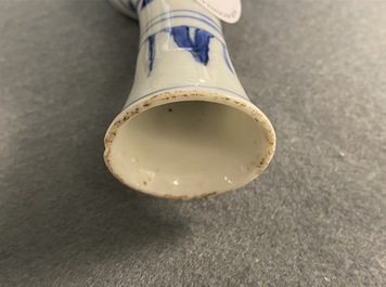 A Chinese blue and white bottle vase with figures in a landscape, Transitional period