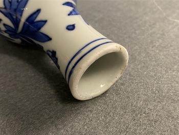 A Chinese blue and white double gourd vase with figures in a landscape, Transitional period