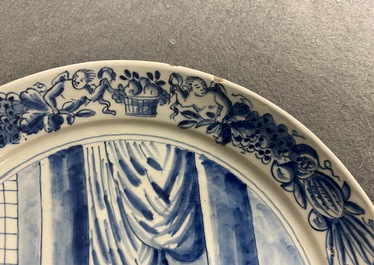 Une paire d'assiettes aux sujets religieux en fa&iuml;ence de Delft en bleu et blanc, 18&egrave;me