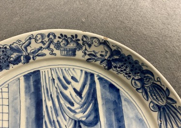 A pair of Dutch Delft blue and white plates with biblical scenes, 18th C.