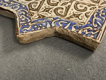 A star-shaped luster-glazed tile, Kashan, Iran, 14th C.