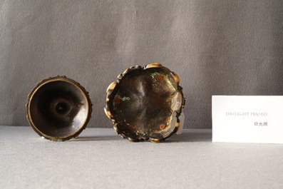 A Chinese bronze tripod censer with 'lotus leaf' cover and stand, 17/18th C.