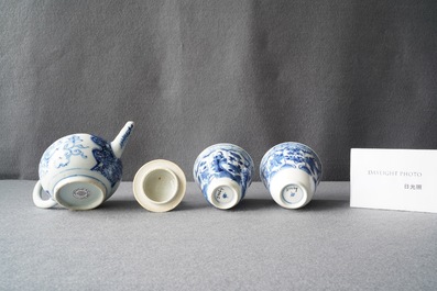 A Chinese blue and white teapot and a pair of wine cups, Kangxi