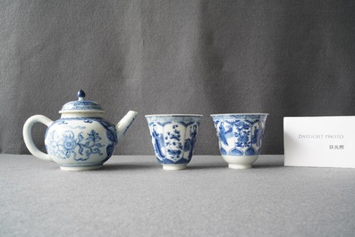 A Chinese blue and white teapot and a pair of wine cups, Kangxi