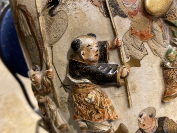 Two Japanese relief-moulded Satsuma vases, Meiji, 19th C.