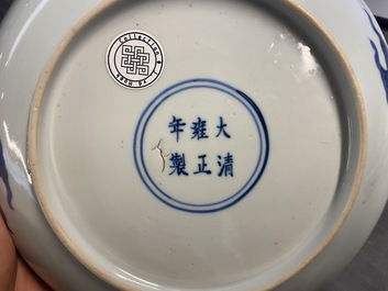 A Chinese blue and white 'dragon and Shou' dish, Yongzheng mark and of the period