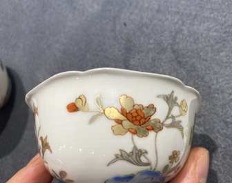 A Chinese gilt-decorated cup and saucer and a floral famille rose cup, Yongzheng