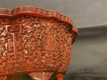 A Chinese carved cinnabar lacquer jardini&egrave;re, Yongzheng/Qianlong