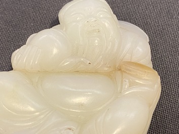 A Chinese white jade figure of Li Taipo, Kangxi/Yongzheng