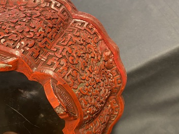 A Chinese carved cinnabar lacquer jardini&egrave;re, Yongzheng/Qianlong