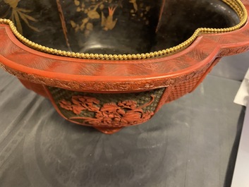A Chinese quatrefoil jardini&egrave;re in red and black lacquer, Qianlong