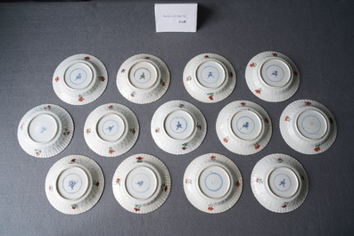 Onze tasses et treize soucoupes en porcelaine de Chine famille verte, Kangxi