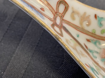 A large Chinese famille rose relief-moulded spoon, Daoguang mark and of the period