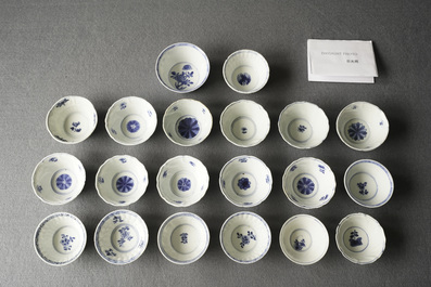 Twenty Chinese blue and white cups and twenty-four saucers, Kangxi