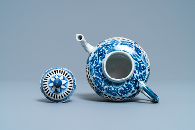 A Chinese blue and white reticulated double-walled teapot and cover, Transitional period