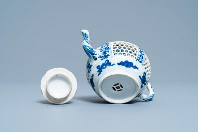 A Chinese blue and white reticulated double-walled teapot and cover, Transitional period