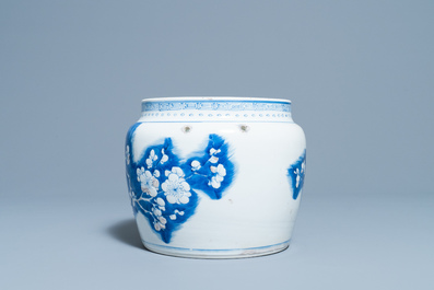 A Chinese blue, white and copper red 'prunus flowers' bowl, Kangxi