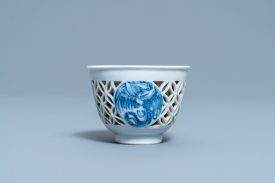A rare Chinese blue and white reticulated double-walled 'fenix' cup, Transitional period