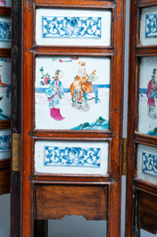 A Chinese wooden four-fold screen with famille rose plaques, 19th C.