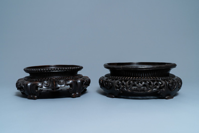 Two large Chinese reticulated wooden stands, 18/19th C.