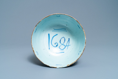 A blue and white English Delftware bowl dated 1684